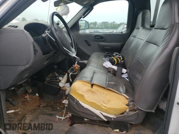 2004 Ford F-150 XL with VIN 2FTRF18244CA43689, listed as a Copart auction lot 57399855 with 152,772 mi miles and Salvage title. Bid and sale history available at DreamBid. Image 7.