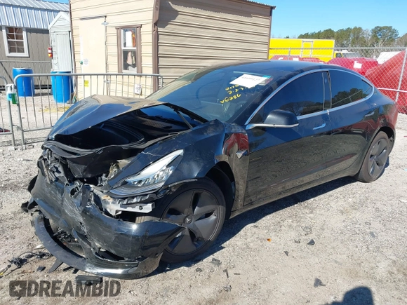 2019 Tesla Model 3 Mid Range with VIN 5YJ3E1EA2KF306286, listed as a IAAI auction lot 41699127 with 56,249 mi miles and . Bid and sale history available at DreamBid. Image 17.