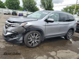 2019 Honda Pilot Touring 8-Passenger z VIN 5FNYF5H91KB033661, wystawiony jako Copart lot #56650155 z przebiegiem 73 512 mil mil oraz Szkoda całkowita • Salvage title. Historia ofert i sprzedaży dostępna na DreamBid. Obrazek 1.