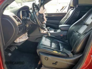 2015 Jeep Grand Cherokee Overland with VIN 1C4RJECG3FC686536, listed as a Copart auction lot 61058215 with 132,282 mi miles and Salvage title. Bid and sale history available at DreamBid. Image 7.