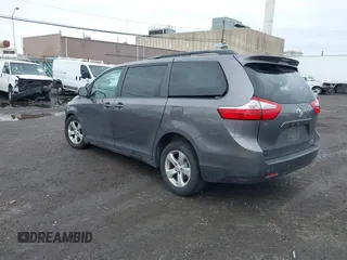 2015 Toyota Sienna LE AAS with VIN 5TDKK3DC1FS615090, listed as a IAAI auction lot 41965112 with 116,745 mi miles. Bid and sale history available at carsss.com. Image 3.