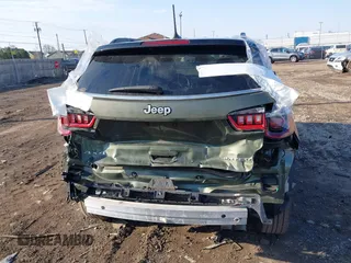2021 Jeep Compass Limited with VIN 3C4NJDCBXMT562925, listed as a IAAI auction lot 38954308 with 55,034 mi miles and . Bid and sale history available at DreamBid. Image 16.