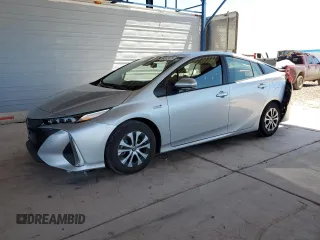 2021 Toyota Prius LE z VIN JTDKAMFP6M3183538, wystawiony jako Copart lot #54267425 z przebiegiem 29 374 mil mil oraz Szkoda całkowita • Salvage title. Historia ofert i sprzedaży dostępna na DreamBid. Obrazek 1.