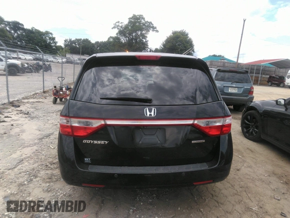 2012 Honda Odyssey Touring with VIN 5FNRL5H97CB066596, listed as a IAAI auction lot 42472935 with 217,182 mi miles and . Bid and sale history available at DreamBid. Image 16.