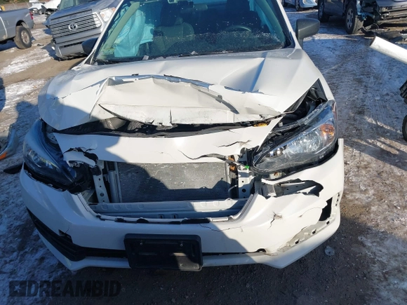 2020 Subaru Impreza with VIN 4S3GKAB61L3600402, listed as a IAAI auction lot 41306036 with 74,468 mi miles and . Bid and sale history available at DreamBid. Image 6.