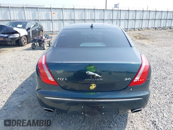 2014 Jaguar XJ Portfolio z VIN SAJWA2GZ4E8V60315, wystawiony jako IAAI lot #42293880 z przebiegiem 97 712 mil mil oraz . Historia ofert i sprzedaży dostępna na DreamBid. Obrazek 16.