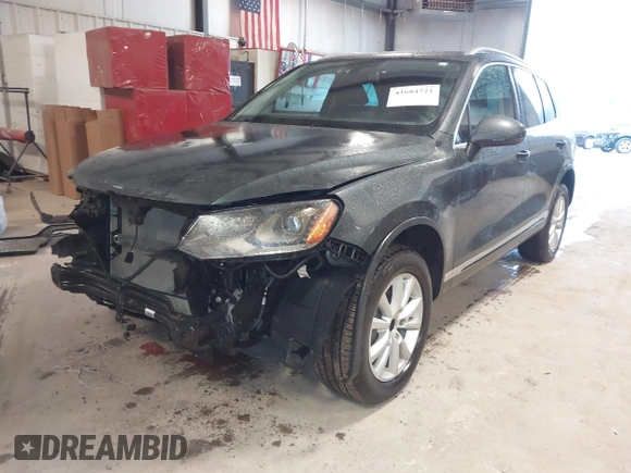 2013 Volkswagen Touareg Lux with VIN WVGEF9BP6DD007032, listed as a IAAI auction lot 41684721 with 147,249 mi miles and . Bid and sale history available at DreamBid. Image 18.