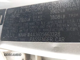 2013 Kia Forte SX with VIN KNAFW4A36D5663328, listed as a IAAI auction lot 41294354 with 172,637 mi miles. Bid and sale history available at carsss.com. Image 9.
