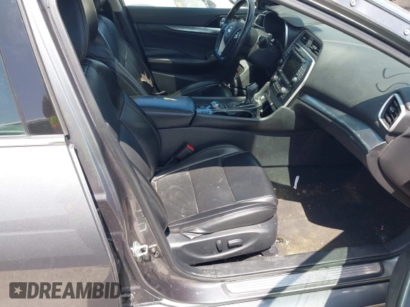 2020 Nissan Maxima SL with VIN 1N4AA6DVXLC373467, listed as a IAAI auction lot 42784055 with 221,014 mi miles and . Bid and sale history available at DreamBid. Image 5.