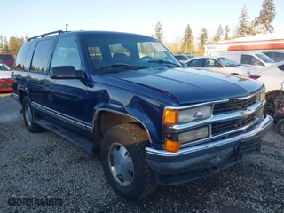 1997 Chevrolet Tahoe with VIN 1GNEK13R4VJ418974, listed as a IAAI auction lot 41560411 with 198,170 mi miles. Bid and sale history available at carsss.com. Image 6.