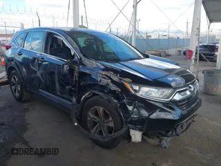 2019 Honda CR-V LX z VIN 2HKRW5H33KH406779, wystawiony jako IAAI lot #41953202 z przebiegiem 73 039 mil mil oraz . Historia ofert i sprzedaży dostępna na DreamBid. Obrazek 1.