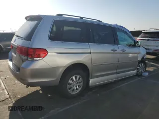 2009 Honda Odyssey EX-L with VIN 5FNRL38619B044063, listed as a Copart auction lot 52372505 with 204,658 mi miles and Salvage Title. Bid and sale history available at DreamBid. Image 3.
