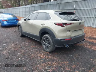 2024 Mazda CX-30 2.5 Carbon Turbo with VIN 3MVDMBXY1RM619079, listed as a IAAI auction lot 41063941 with 11,010 mi miles. Bid and sale history available at carsss.com. Image 3.