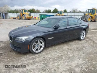 2014 BMW 7 Series 740Li with VIN WBAYE4C56ED138397, listed as a IAAI auction lot 41726117 with 116,291 mi miles. Bid and sale history available at carsss.com. Image 2.