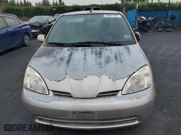 2003 Toyota Prius z VIN JT2BK18U430088533, wystawiony jako Copart lot #56091295 z przebiegiem 112 210 mil mil oraz Czysty tytuł • Clean title. Historia ofert i sprzedaży dostępna na DreamBid. Obrazek 5.