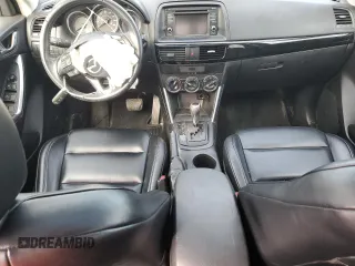 2014 Mazda CX-5 Touring with VIN JM3KE2CY9E0375990, listed as a Copart auction lot 50875165 with 166,574 mi miles and Salvage Title. Bid and sale history available at carsss.com. Image 8.