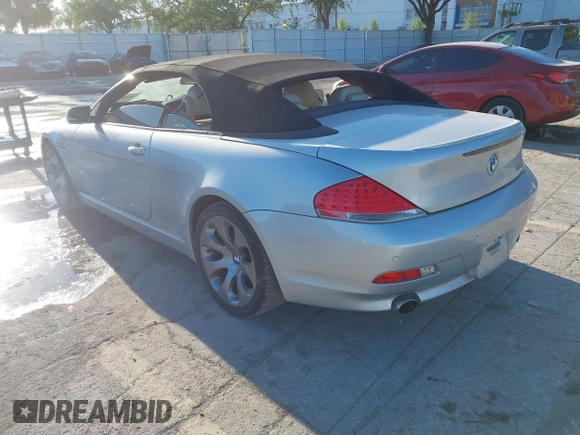 2006 BMW 6 Series 650Ci z VIN WBAEK13446CN77929, wystawiony jako IAAI lot #41853425 z przebiegiem 133 515 mil mil oraz . Historia ofert i sprzedaży dostępna na DreamBid. Obrazek 3.