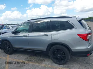 2022 Honda Pilot Special Edition with VIN 5FNYF5H21NB012512, listed as a IAAI auction lot 40677729 with 202,674 mi miles and . Bid and sale history available at carsss.com. Image 14.