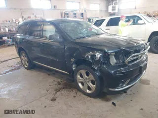 2014 Dodge Durango Limited with VIN 1C4RDJDG1EC973130, listed as a IAAI auction lot 41846596 with 166,182 mi miles. Bid and sale history available at carsss.com. Image 1.