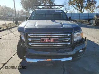 2015 GMC Canyon 2WD SLE with VIN 1GTG5BE38F1240947, listed as a Copart auction lot 82707204 with 63,049 mi miles and Salvage Title. Bid and sale history available at carsss.com. Image 5.