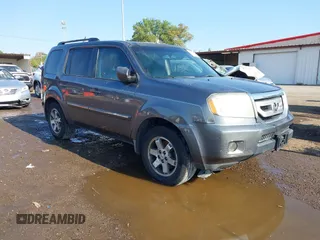 2010 Honda Pilot Touring with VIN 5FNYF3H87AB006023, listed as a IAAI auction lot 40310546 with 135,482 mi miles and . Bid and sale history available at carsss.com. Image 1.