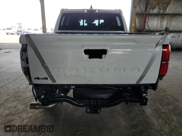 2025 Toyota Tacoma SR with VIN 3TMLB5JN0SM088997, listed as a Copart auction lot 50373065 with 2,934 mi miles and Salvage Title. Bid and sale history available at DreamBid. Image 6.