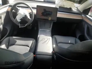 2025 Tesla Model Y Long Range with VIN 7SAYGAEEXSF253326, listed as a Copart auction lot 49527965 with 5,803 mi miles and Salvage Title. Bid and sale history available at DreamBid. Image 8.