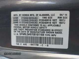 2014 Honda Odyssey Touring with VIN 5FNRL5H97EB101169, listed as a IAAI auction lot 41869233 with 142,147 mi miles and . Bid and sale history available at DreamBid. Image 9.