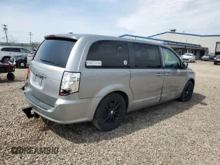 2014 Dodge Grand Caravan SXT with VIN 2C4RDGCG4ER114464, listed as a Copart auction lot 52480965 with 125,212 mi miles and Salvage Title. Bid and sale history available at DreamBid. Image 3.