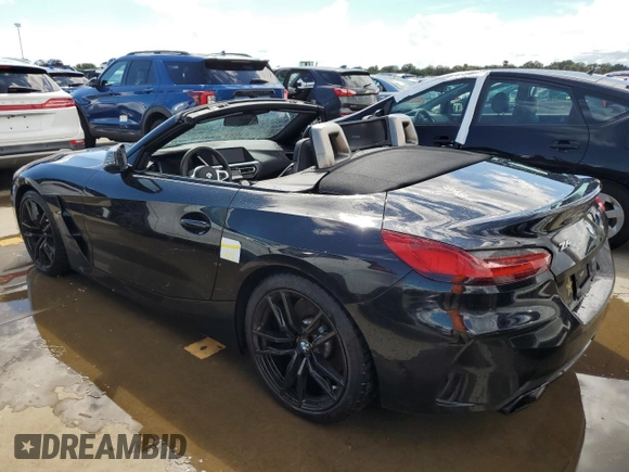 2020 BMW Z4 sDriveM40i z VIN WBAHF9C08LWW33054, wystawiony jako Copart lot #73803034 z przebiegiem Nie podano mil oraz Nie do naprawy. Historia ofert i sprzedaży dostępna na DreamBid. Obrazek 2.