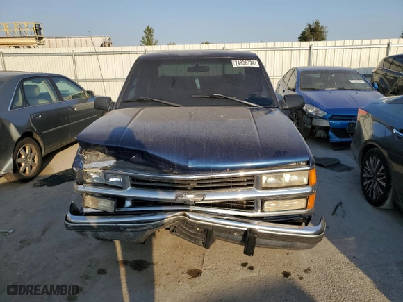 1999 Chevrolet C/K 1500 with VIN 1GCEC19R7XR140542, listed as a Copart auction lot 74936724 with 348,313 mi miles and Salvage Title. Bid and sale history available at carsss.com. Image 5.