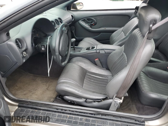 1999 Pontiac Firebird Firebird with VIN 2G2FS22K1X2209517, listed as a Copart auction lot 57304765 with 86,094 mi miles and Clean title. Bid and sale history available at DreamBid. Image 7.
