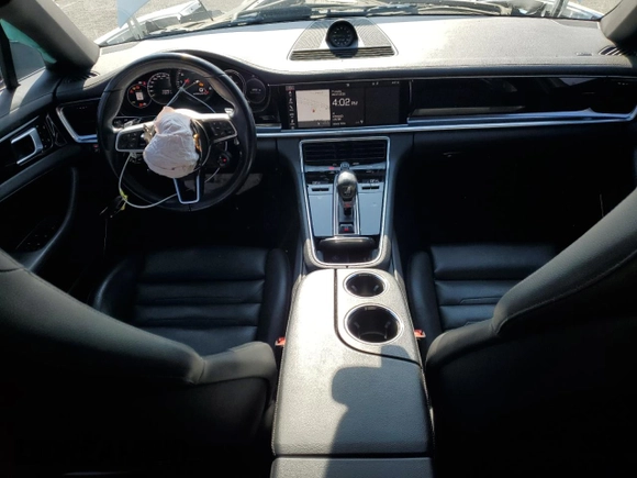 2018 Porsche Panamera 4 E-Hybrid z VIN WP0AE2A75JL130885, wystawiony jako Copart lot #55447835 z przebiegiem 76 932 mil mil oraz Szkoda całkowita • Salvage title. Historia ofert i sprzedaży dostępna na DreamBid. Obrazek 8.