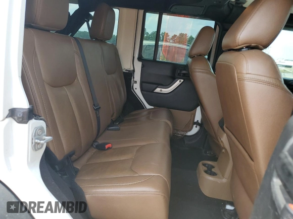 2016 Jeep Wrangler Unlimited Rubicon с VIN 1C4BJWFGXGL349057, выставлен на аукционе Copart как лот 61608945 с пробегом 118 200 миль миль и Списание • Salvage title. История ставок и продаж доступна на DreamBid. Изображение 11.