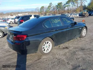 2014 BMW 5 Series 528i with VIN WBA5A5C58ED503179, listed as a IAAI auction lot 38938015 with 130,230 mi miles. Bid and sale history available at carsss.com. Image 4.