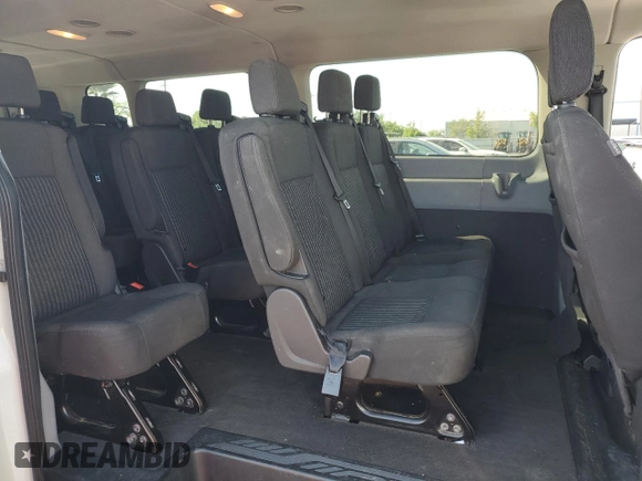 2018 Ford Transit Passenger XL z VIN 1FBZX2YM8JKA97299, wystawiony jako Copart lot #53553115 z przebiegiem 101 532 mil mil oraz Szkoda całkowita • Salvage title. Historia ofert i sprzedaży dostępna na DreamBid. Obrazek 11.