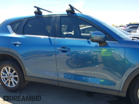 2022 Mazda CX-5 2.5 S Preferred Package with VIN JM3KFBCM8N1583959, listed as a IAAI auction lot 41880039 with 45,865 mi miles. Bid and sale history available at carsss.com. Image 13.