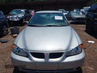 2004 Pontiac Grand Am SE1 z VIN 1G2NF52E14C138620, wystawiony jako IAAI lot #42211838 z przebiegiem 257 740 mil mil oraz . Historia ofert i sprzedaży dostępna na DreamBid. Obrazek 6.