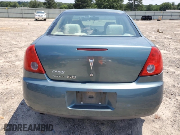 2009 Pontiac G6 1SA with VIN 1G2ZG57B294112753, listed as a Copart auction lot 60333295 with 172,422 mi miles and Salvage title. Bid and sale history available at DreamBid. Image 6.