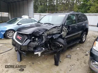 2004 GMC Envoy SLT with VIN 1GKDT13S942279670, listed as a Copart auction lot 73527974 with 120,425 mi miles and Salvage Title. Bid and sale history available at DreamBid. Image 1.