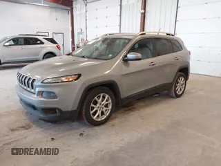 2014 Jeep Cherokee Latitude with VIN 1C4PJLCS1EW106004, listed as a IAAI auction lot 41786457 with 145,588 mi miles. Bid and sale history available at carsss.com. Image 17.