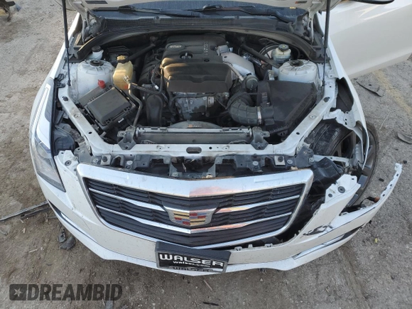 2018 Cadillac ATS AWD z VIN 1G6AE5RX3J0138669, wystawiony jako Copart lot #83647714 z przebiegiem 74 143 mil mil oraz Szkoda całkowita • Salvage title. Historia ofert i sprzedaży dostępna na DreamBid. Obrazek 11.