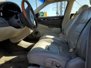 2002 Cadillac DeVille DHS z VIN 1G6KE54Y62U248629, wystawiony jako Copart lot #79825284 z przebiegiem 99 568 mil mil oraz Szkoda całkowita • Salvage title. Historia ofert i sprzedaży dostępna na DreamBid. Obrazek 7.