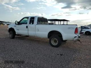 2000 Ford F-250 XL with VIN 1FTNX21FXYEE45263, listed as a Copart auction lot 55044075 with 451,212 mi miles and Salvage title. Bid and sale history available at DreamBid. Image 2.