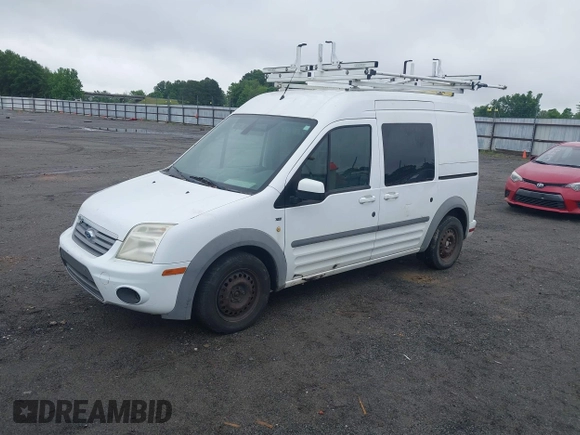 2012 Ford Transit Connect XLT with VIN NM0KS9BN0CT099550, listed as a IAAI auction lot 42213571 with 157,158 mi miles and . Bid and sale history available at DreamBid. Image 2.