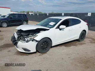 2014 Mazda 3 i Grand Touring with VIN JM1BM1W70E1143703, listed as a IAAI auction lot 41883130 with 135,500 mi miles and . Bid and sale history available at DreamBid. Image 2.