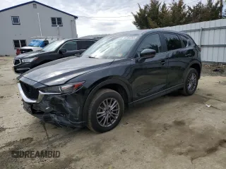 2017 Mazda CX-5 Touring with VIN JM3KFACLXH0195725, listed as a Copart auction lot 47464365 with 65,457 mi miles and Salvage Title. Bid and sale history available at carsss.com. Image 1.