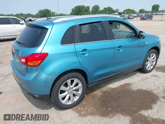 2014 Mitsubishi Outlander SE z VIN 4A4AR4AU2EE026685, wystawiony jako IAAI lot #42481070 z przebiegiem 136 279 mil mil oraz . Historia ofert i sprzedaży dostępna na DreamBid. Obrazek 4.