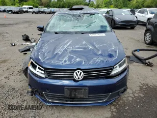 2013 Volkswagen Jetta TDI w/Premium with VIN 3VWLL7AJ6DM386508, listed as a Copart auction lot 57067455 with 127,573 mi miles and Salvage title. Bid and sale history available at DreamBid. Image 5.