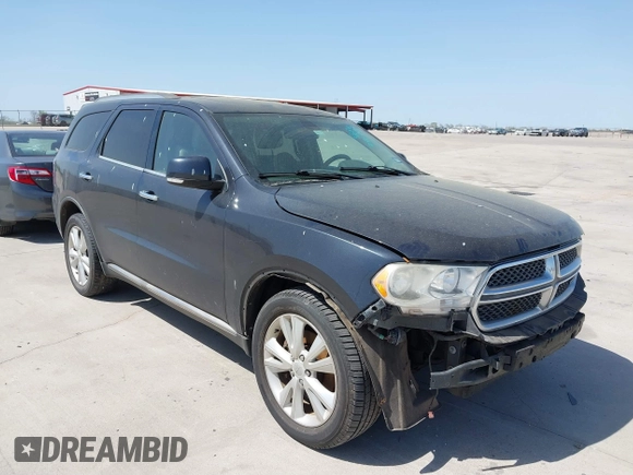 2013 Dodge Durango Crew with VIN 1C4SDHDT5DC637535, listed as a IAAI auction lot 41867982 with 162,569 mi miles and . Bid and sale history available at DreamBid. Image 1.